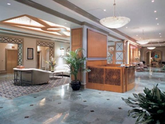 Lobby with 24-7 concierge, secured access building, touchless car transponder opens gate to garage.