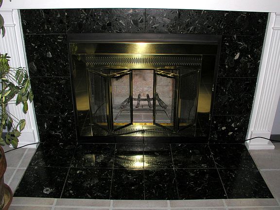 Black and Emerald Granite Fireplace