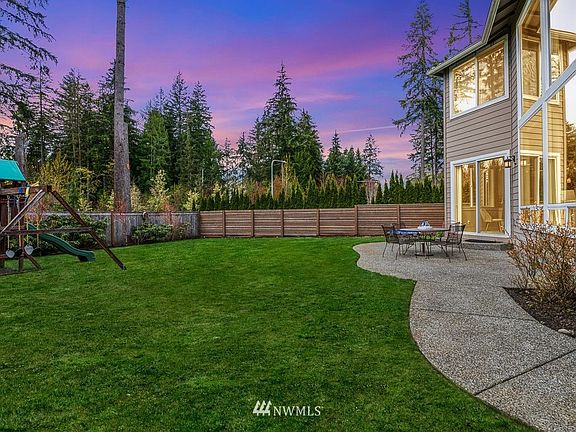 Luxury and tranquility meet in this captivating sanctuary with 5 bedrooms, 4.5 baths, 4,146 sq. ft.. Guest suite on the main floor and upper level.