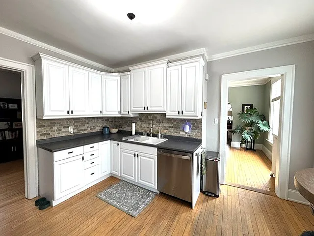Kitchen with all new stainless steel appliances.