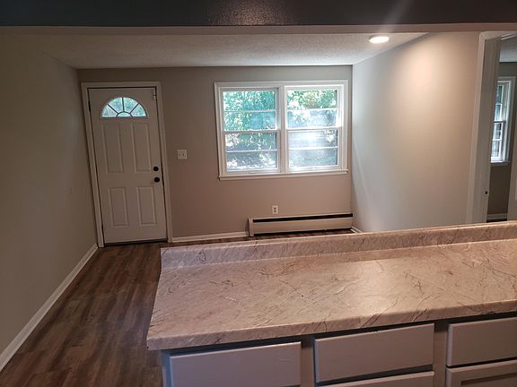 Dining room and back door to the duplex.