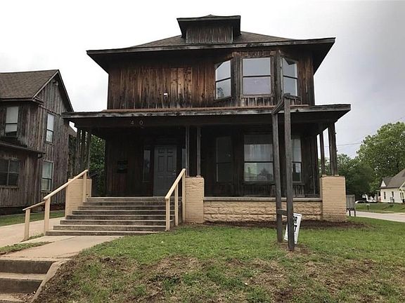 430 N Kickapoo.  Two units under one roof.  Each currently rents for 750, for a total of 1500 per month.  Good tenants.  Front entry for the bottom unit, side entry for the top unit.