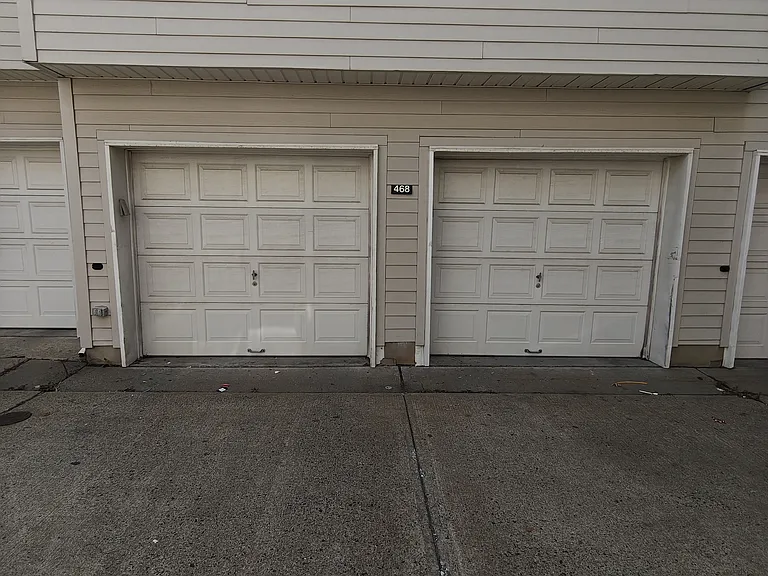 Large two_car garage complemented by a separate storage room_ideal for tools, seasonal items, or extra belongings.