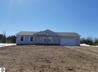 8592 King Arthurs Ct, Kingsley, MI 49649