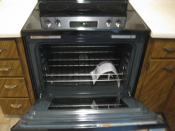 brand new SS smooth top range with SS hood