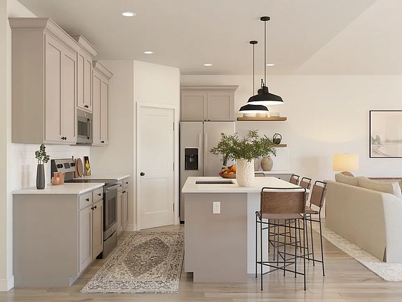 Kitchen with quartz island and countertops