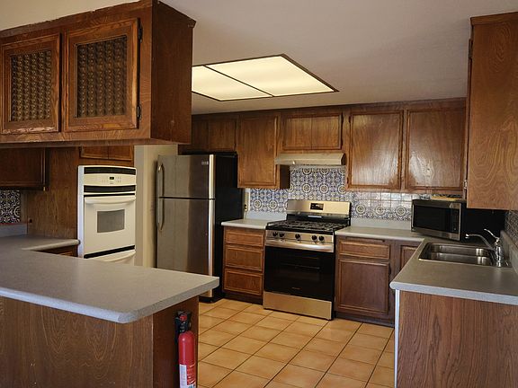 New range, dishwasher and range hood.