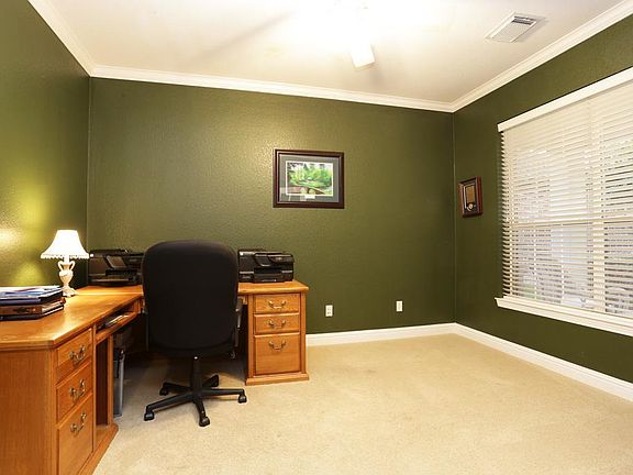 The study is a great size and can be made completely private with the french doors the seller had installed.