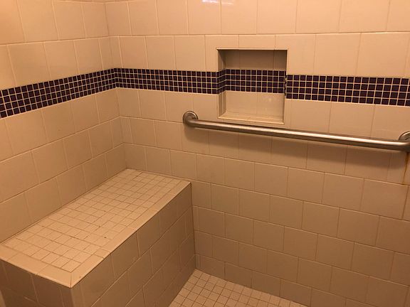 WALK IN SHOWER WITH SEATING (MASTER BEDROOM)