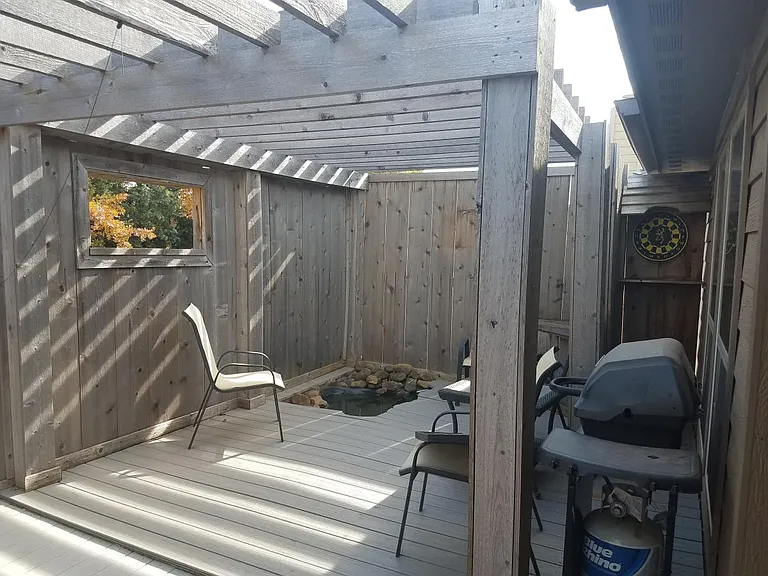 Deck Sitting Area with Fish Pond
