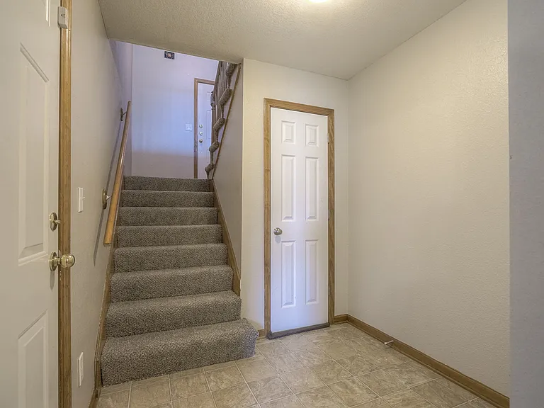 Foyer off of garage and small closet