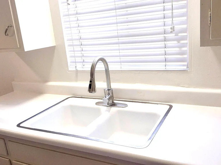 Kitchen sink with pulldown faucet.