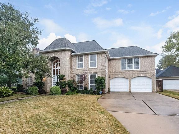 This Stately Brick Home Could be Yours, next to Green Walking Trails at the end of a CDS, with Beautiful Views
