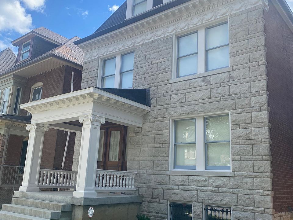Majestic facade with new roof, new windows, relaid chimneys, rebuilt front porch