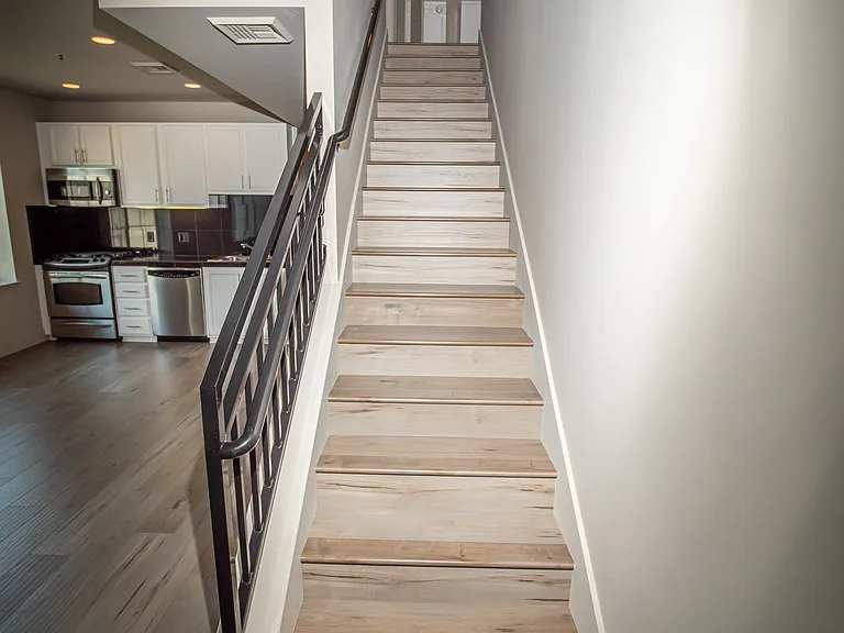 Stairs to Open Loft Bedroom, Full Laundry, Walk-In Closet and Balcony