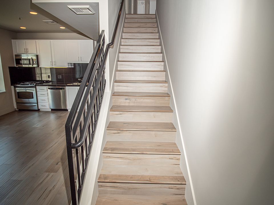 Stairs to Open Loft Bedroom, Full Laundry, Walk-In Closet and Balcony