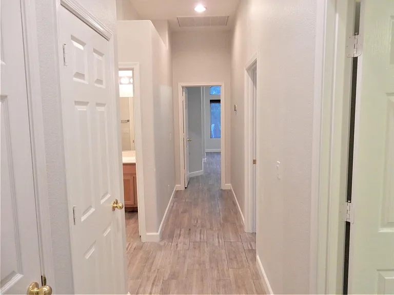 Hallway from laundry to bedrooms