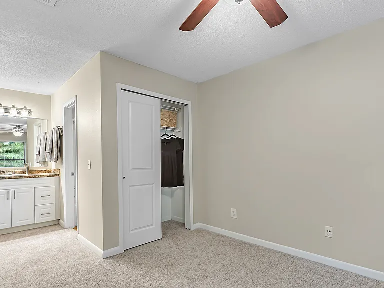 Immerse yourself in a majestic master suite boasting opulent closets and regal design details for sophisticated indulgence.