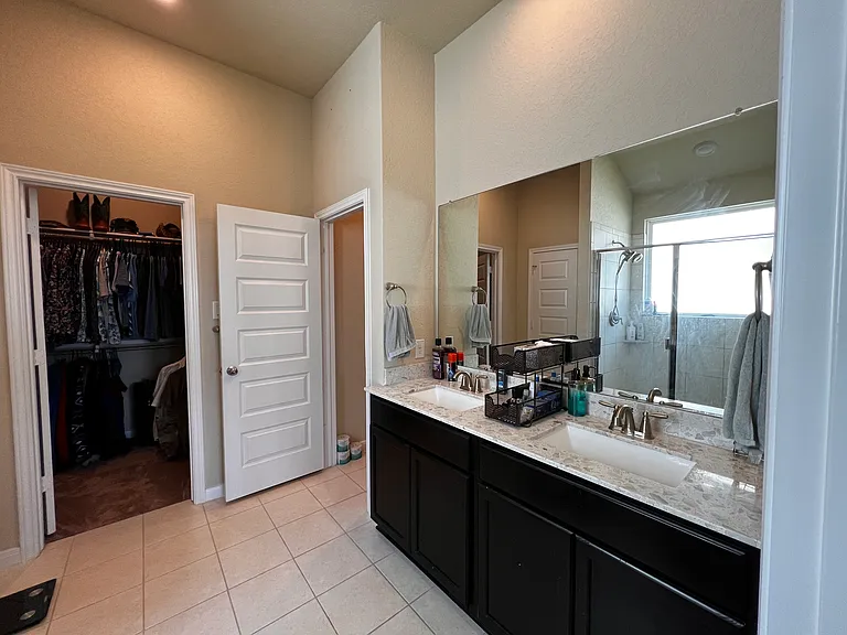 Master bathroom, two sinks, walk-in closet
