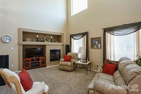 Two Story Great Room with Media Niche & Fireplace