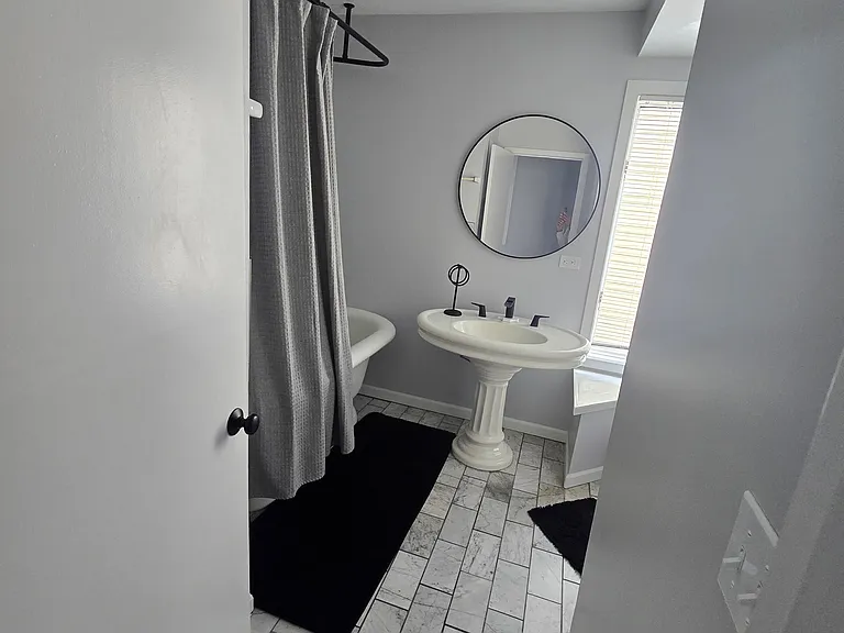Updated Bath with large tub and linen closet