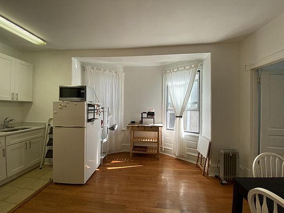 Living room with a part of new kitchen
