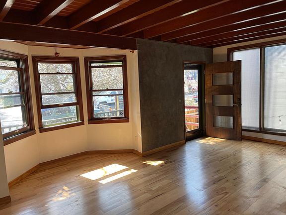 Living Room with Wood Burning Fireplace