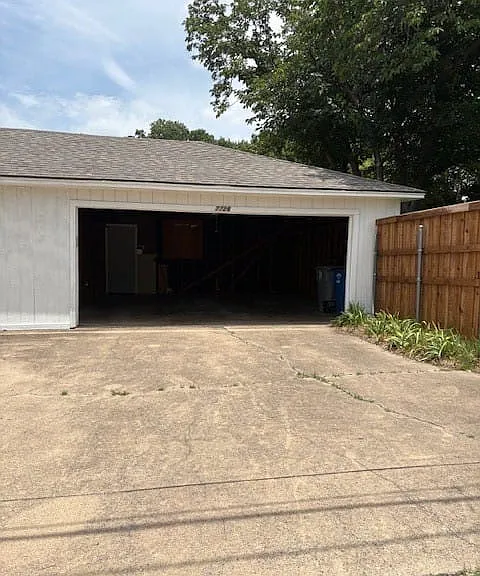 view into the garage from the alley