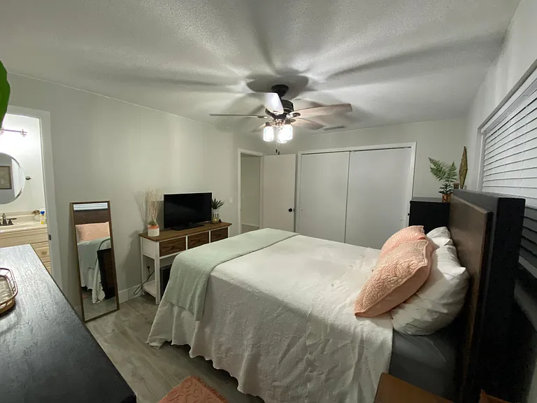 Primary bedroom with ensuite bath and large closet