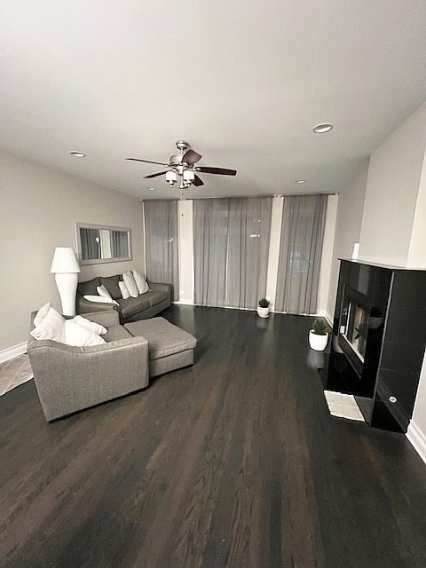 Upstairs living room with woodburning fireplace (option to keep furnished)