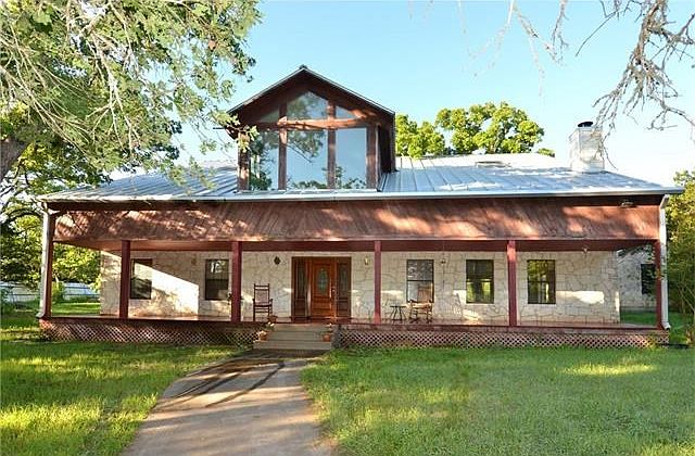 Welcoming entrance with wonderfully inviting front porch.