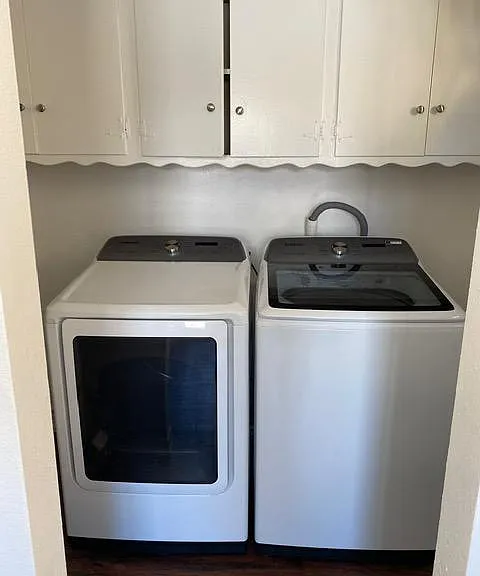 Smart Samsung washer and dryer in the laundry room.