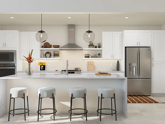 Kitchen with pendant lighting and floating shelves