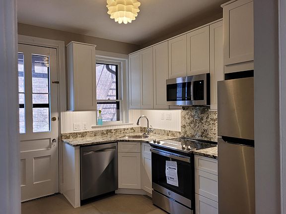Brand new kitchen cabinets, appliances and floors. Walk out to pedestrian Court Street.