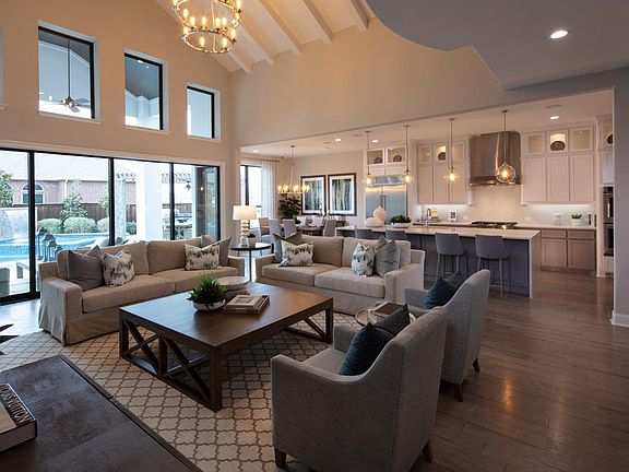 Beamed ceiling and multi-slide glass doors in great room