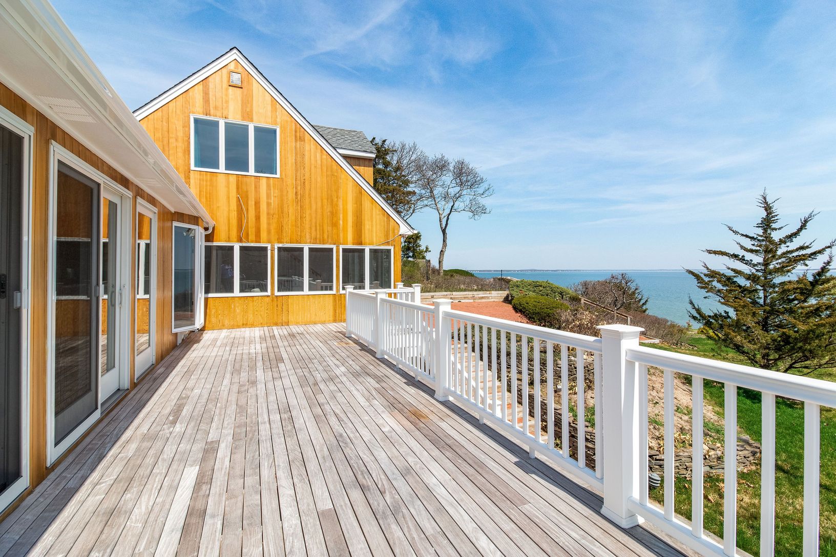  Wooden deck featuring a water view