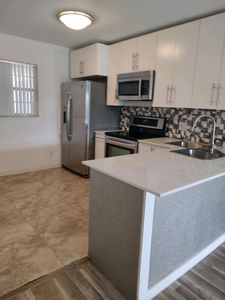 12009 Poinciana Boulevard #103, Royal Palm Beach, FL, 33411