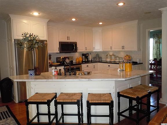 3rd image of 10083 Sidney Cherry Grove Rd.