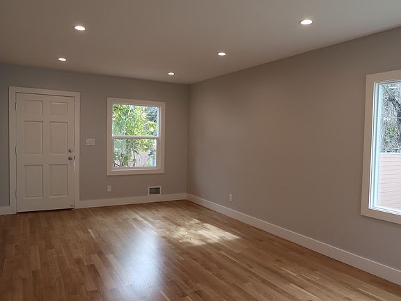 Living room facing front entry.