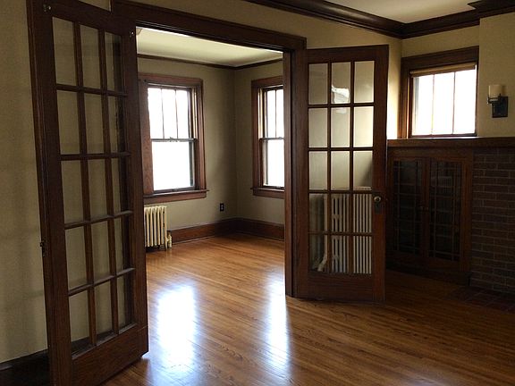 French Doors Open to Sunroom