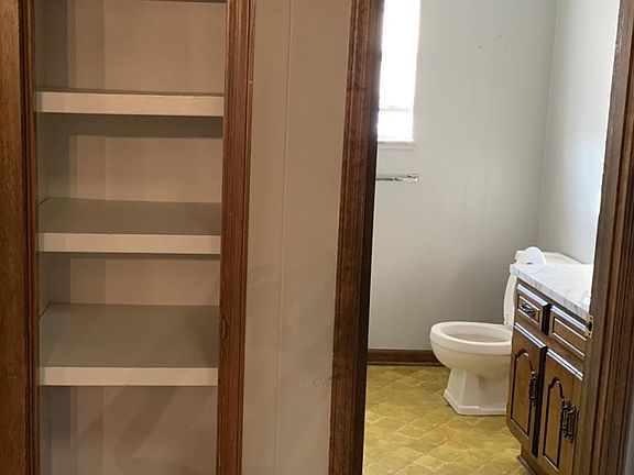 Linen closet in hallway and bathroom