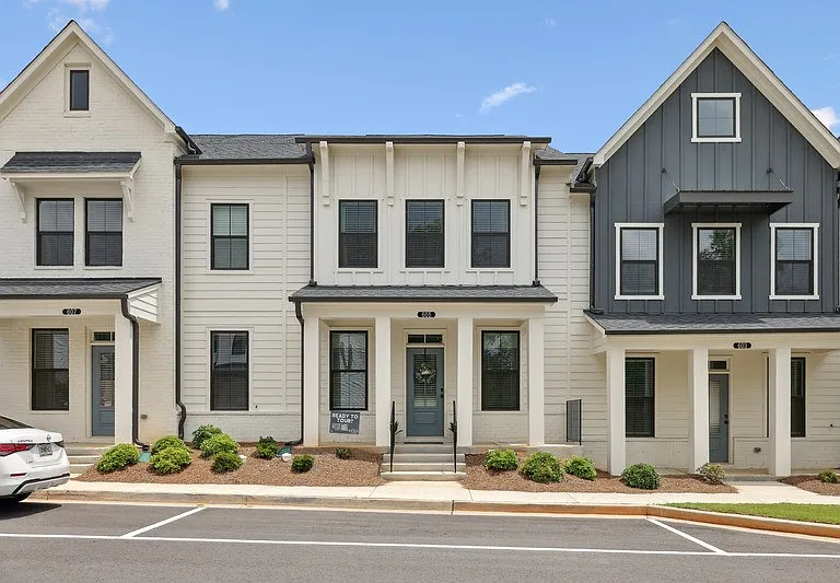Exterior of the Bartow, two story townhome with a private entrance.