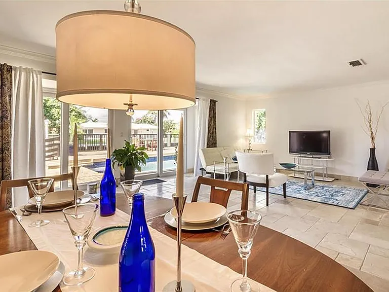 Dining area and view on the backyard
Please note that the listing pictures include staged scenery to help you visualize how you might furnish the space in a style you prefer