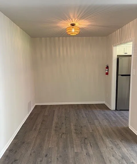 Dining Room with Access to the Kitchen and Second Floor Living Area