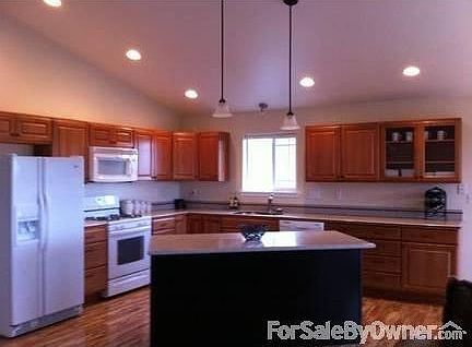 Large kitchen with custom counters