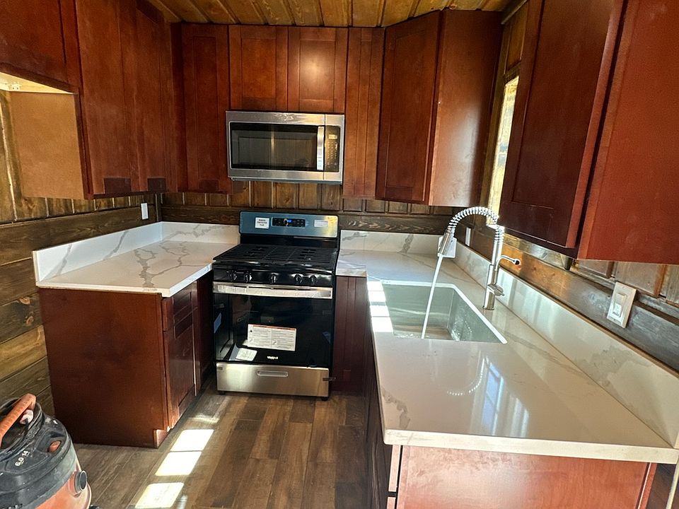 New kitchen with plenty cabinets .