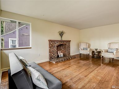Enjoy the Large Living room with a fireplace and plenty of room to  meet with friends.  