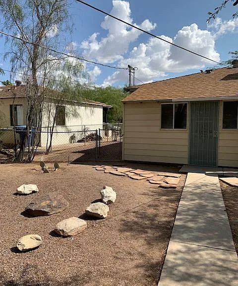 Plenty of backyard space for grilling and outdoor dining. Completely fenced yard.