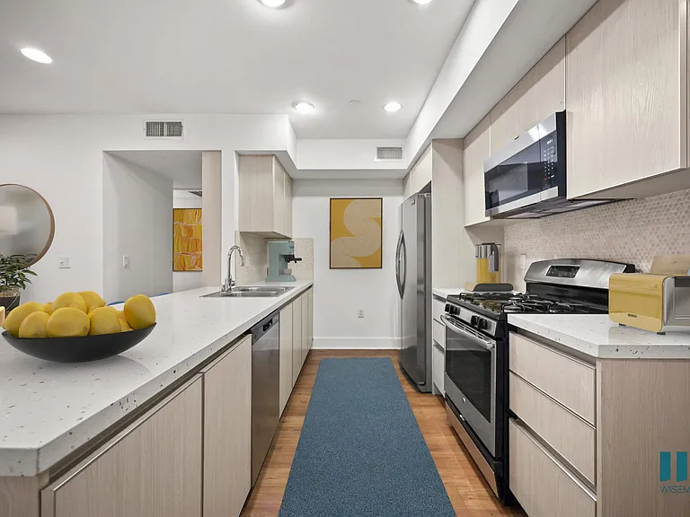 Kitchen with Energy-Efficient Appliances and Ample Cabinet Storage