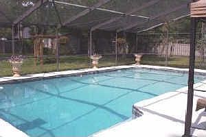 Screened Pool and Beautiful Backyard